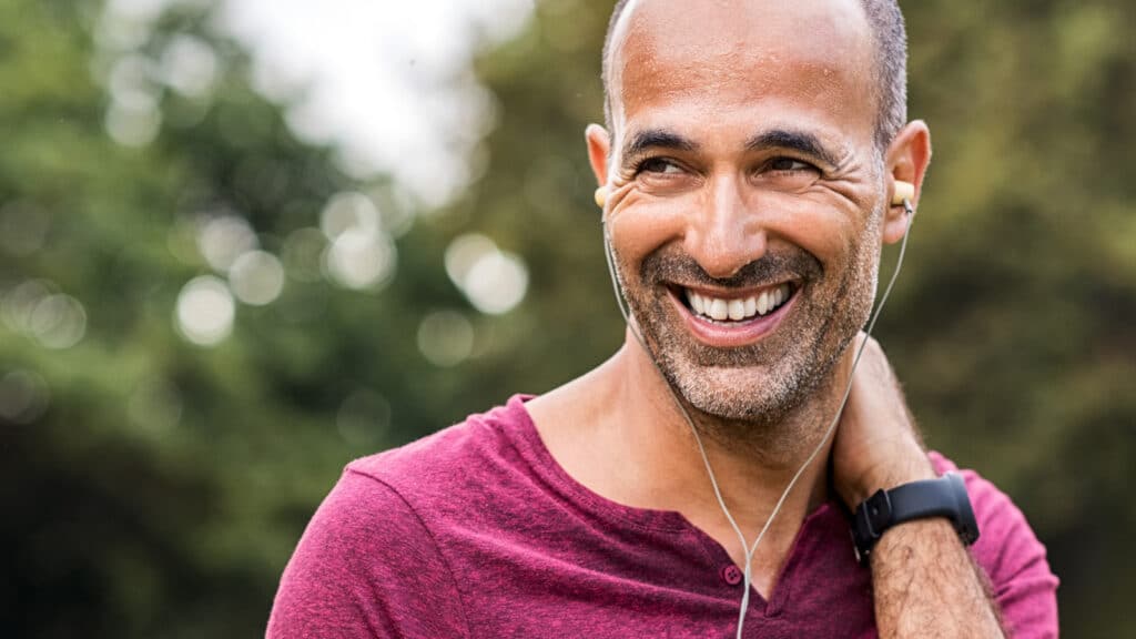 A man with big healthy smile after a periodontal deep cleaing in Colorado Springs